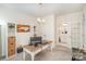 Functional home office featuring a desk, storage shelves, a door to the bathroom, and a comfortable workspace at 635 R L Stowe Rd, Belmont, NC 28012