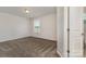 This bedroom features plush carpet, neutral walls, and a window letting in natural light at 732 Altamonte Dr, Clover, SC 29710