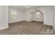 Upstairs bedroom with dormer windows and neutral paint and carpet throughout at 732 Altamonte Dr, Clover, SC 29710