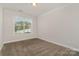 Bedroom with carpet, neutral paint and a window for natural light at 732 Altamonte Dr, Clover, SC 29710