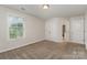 Bedroom with carpet, double door closet and large window at 732 Altamonte Dr, Clover, SC 29710