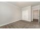 Neutral bedroom with carpeted floor, and a closet. The doorway leads to another room at 732 Altamonte Dr, Clover, SC 29710