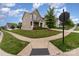 Inviting two-story home with a lush green lawn and sidewalk on a corner lot at 732 Altamonte Dr, Clover, SC 29710