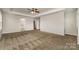 Huge main bedroom featuring neutral walls, carpeting and a glimpse of the attached bathroom at 732 Altamonte Dr, Clover, SC 29710