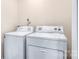 Laundry room with washer and dryer at 7912 Charter Oak Ln, Charlotte, NC 28226