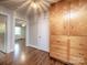 Hallway with hardwood floors and a spacious built-in wardrobe at 848 Woodland Rd, Statesville, NC 28677
