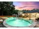 Backyard at sunset featuring an in-ground pool, a gazebo covered seating area, and a lush green lawn at 932 Shady Bluff Dr, Charlotte, NC 28211