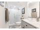 Modern bathroom featuring a glass enclosed shower, patterned tile floor, and neutral paint at 932 Shady Bluff Dr, Charlotte, NC 28211