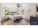 Bedroom with natural light, stylish furnishings, and relaxing ambiance at 932 Shady Bluff Dr, Charlotte, NC 28211