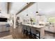 Bright open floor plan with gourmet kitchen island and stainless steel farmhouse sink at 932 Shady Bluff Dr, Charlotte, NC 28211