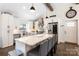 Bright kitchen featuring stainless steel appliances, quartz counters, and a large island at 932 Shady Bluff Dr, Charlotte, NC 28211