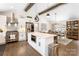 Kitchen island with stainless steel oven with adjoining eat-in dining area and kitchen at 932 Shady Bluff Dr, Charlotte, NC 28211