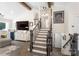 Open staircase and living room area filled with light and modern furnishings at 932 Shady Bluff Dr, Charlotte, NC 28211