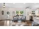 Cozy sitting area near the front door with comfortable chairs and view of the front yard at 932 Shady Bluff Dr, Charlotte, NC 28211