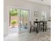 Bright breakfast nook with sliding doors that lead to an outdoor patio at 9451 Bonnie Briar Cir, Charlotte, NC 28277
