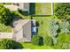 Aerial view of a house with a well-maintained lawn, mature trees, a gazebo, and a fenced backyard at 1006 Apogee Dr, Indian Trail, NC 28079