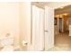 Bright bathroom with a toilet and bathtub/shower combination and an open doorway leading to other rooms at 1006 Apogee Dr, Indian Trail, NC 28079