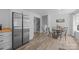 Open dining area with stainless steel refrigerator and staircase nearby at 1013 Eaglewood Ave, Charlotte, NC 28212