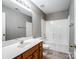 Standard bathroom with a shower-tub combination, single sink vanity, and tile flooring at 10446 Trolley Run Dr, Cornelius, NC 28031