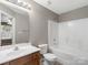 Bathroom with a vanity, toilet, and a shower-tub combo, providing all essential fixtures and features at 10446 Trolley Run Dr, Cornelius, NC 28031