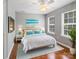 Comfortable bedroom with a large bed, stylish decor, and plenty of natural light, creating a relaxing space at 10446 Trolley Run Dr, Cornelius, NC 28031