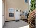Outdoor patio area with siding and well-maintained landscaping at 10446 Trolley Run Dr, Cornelius, NC 28031