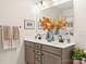 Bathroom with double sink vanity, stylish fixtures, and neutral decor at 12016 Basking Dr, Charlotte, NC 28214