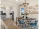 Stylish dining area featuring a modern table, chandelier, and an inviting ambiance at 12016 Basking Dr, Charlotte, NC 28214