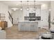 Modern kitchen featuring an island, stainless steel appliances, and pendant lighting at 12016 Basking Dr, Charlotte, NC 28214