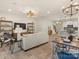 Open-concept living space connecting the kitchen, dining, and Gathering room areas at 12016 Basking Dr, Charlotte, NC 28214
