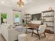 Cozy living room with modern furnishings, natural light, and stylish decor elements at 12016 Basking Dr, Charlotte, NC 28214