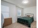 Cozy bedroom with wood-look flooring and natural light at 1256 Canseco Ln, Hickory, NC 28602