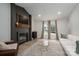 Cozy living room with a modern fireplace, a large TV, and comfortable seating area at 1256 Canseco Ln, Hickory, NC 28602