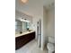 Bathroom featuring a double vanity and separate toilet room at 1304 Ridge Haven Rd, Waxhaw, NC 28173