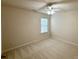 Neutral bedroom featuring a ceiling fan and carpeted flooring at 1304 Ridge Haven Rd, Waxhaw, NC 28173