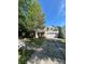 Beautiful two-story home with brick accents, a two-car garage, mature landscaping, and a welcoming driveway at 1304 Ridge Haven Rd, Waxhaw, NC 28173
