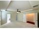 Large main bedroom featuring tray ceilings, neutral carpet, and natural light at 1304 Ridge Haven Rd, Waxhaw, NC 28173