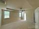 Spacious main bedroom with large windows and tray ceiling at 1304 Ridge Haven Rd, Waxhaw, NC 28173