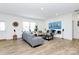 Spacious living room with modern decor, natural light, and stylish furnishings at 13140 Sudwick Ln, Charlotte, NC 28278