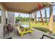 This spacious patio features a colorful table and seating for entertaining at 13140 Sudwick Ln, Charlotte, NC 28278