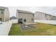 The backyard features a concrete patio, a pergola, grass and landscaping, all enclosed by a white privacy fence at 1323 Mifflin Ln, Dallas, NC 28034