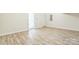 Open basement featuring wood floors, neutral walls, and ample natural light at 1323 Mifflin Ln, Dallas, NC 28034