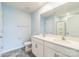 Modern bathroom featuring a double vanity, large mirror, and a glass-enclosed shower at 1323 Mifflin Ln, Dallas, NC 28034
