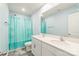 Well-lit bathroom features a double vanity with white countertop and modern fixtures at 1323 Mifflin Ln, Dallas, NC 28034