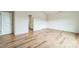 Bedroom with ensuite bathroom and wood-look flooring at 1323 Mifflin Ln, Dallas, NC 28034