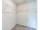 Walk-in closet with wire shelving and carpeted floor at 1323 Mifflin Ln, Dallas, NC 28034