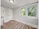 Bedroom featuring wood floors and dual windows, and ample light at 144 Walnut St, Chester, SC 29706