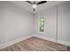 Cozy bedroom with neutral colors, wood floors, and lots of light at 144 Walnut St, Chester, SC 29706