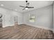 Open living room with hardwood floors, natural light, and neutral walls at 144 Walnut St, Chester, SC 29706