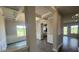 Formal dining room boasting coffered ceilings, wainscoting, and natural light, blending elegance with functionality at 1459 Mocksville Hwy # 19, Statesville, NC 28625